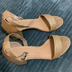 Gold glittery high heels